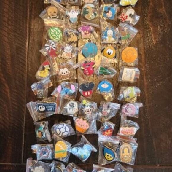 Disney Jewelry - Disney Pin Bundle – 25 Different Pins, Free Shipping!